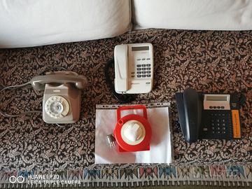 Tre telefoni tre con lunga prolunga