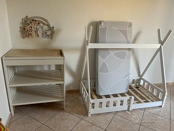 Fasciatoio e letto montessoriano