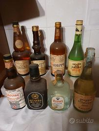 8 bottiglie grappa da collezione 