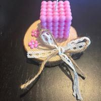 Candela su base di legno