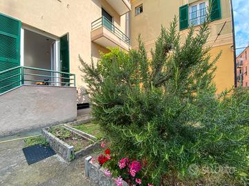 Appartamento con giardino e posto auto