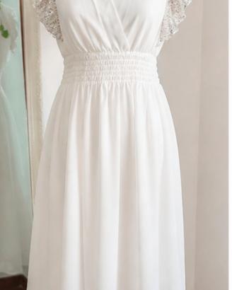 Abito bianco elegante con paillettes