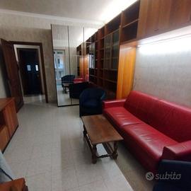 soggiorno pranzo arredamento ponte a parete