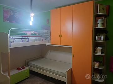 Camera da letto con soppalco