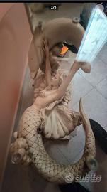 Tavolo da salotto con sirena e delfino