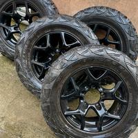 4 gomme MUD 195/80 R15 + 4 cerchi in lega neri