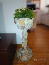 Colonna in pietra porta pianta