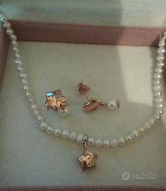 In coppia Pandora Collana e orecchini Lucky Star