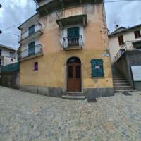 Casa con giardino