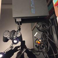 Playstation 2 + tre giochi e accessori