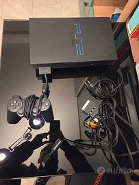 Playstation 2 + tre giochi e accessori