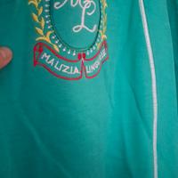 vestaglia verde di  Malizia, veste una TG 50
