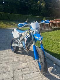 TM 125 