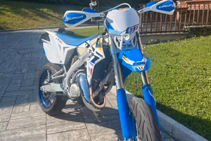 TM 125 