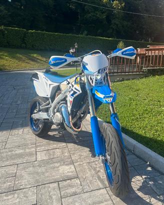 TM 125 
