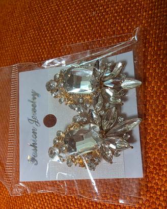 Orecchini pendenti effetto specchio