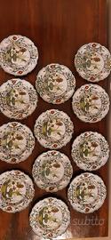 Servizio di 12 piatti antica maiolica di Faenza 