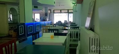 Locale commerciale con canna fumaria