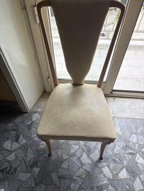 Sei Sedie in pelle e struttura in legno. Anni '60.