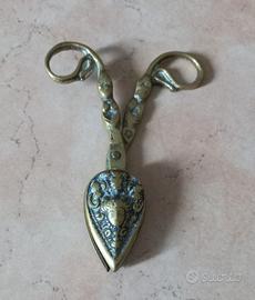 Forbice spegnicandela