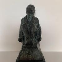 SCULTURA IN BRONZO DI UOMO SEDUTO-FIRMATA