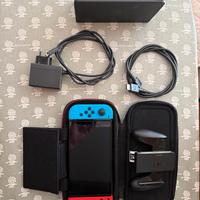 Nintendo Switch OLED + custodia Mario kart