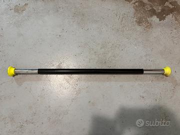 Sbarra per trazioni alla porta regolabile