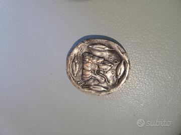 Moneta Antica Romana Leone e Divinità