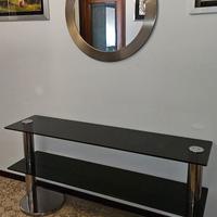 Consolle in acciaio e cristallo con specchio