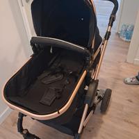 carrozzina per bambini e altalena elettrica 