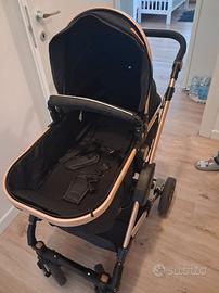 carrozzina per bambini e altalena elettrica 