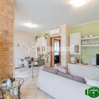 TRILOCALE CON GIARDINO PRIVATO