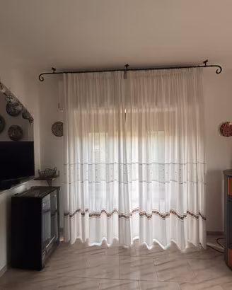 Bastone tende in ferro con tende su misura