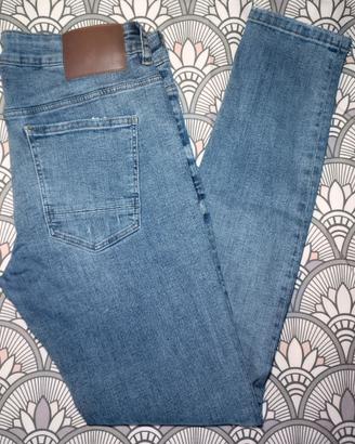 Pantalone Denim jeans chiaro strappi uomo