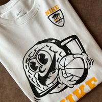 T-shirt Nike bianca con stampa