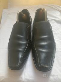 Mocassini neri Prada uomo