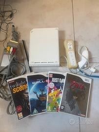 Nintendo Wii console con 4 giochi