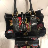 Borsa cavalli e portafoglio