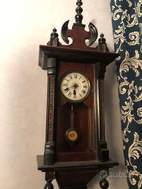 Orologio a pendolo da parete