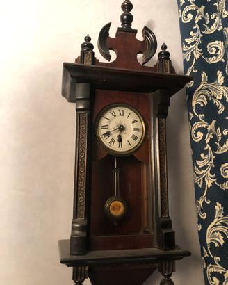 Orologio a pendolo da parete