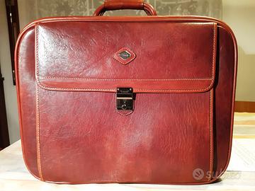 Valigia vintage "I Santi" da viaggio in pelle .