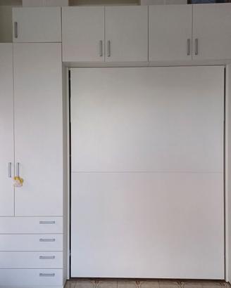 Letto a scomparsa ideale per b&b o spazi piccoli.