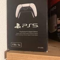 Ps5 con disco, joystick e giochi