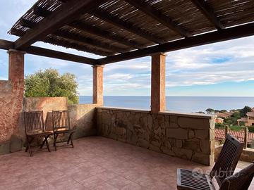 Graziosa villetta a schiera con giardino e vista