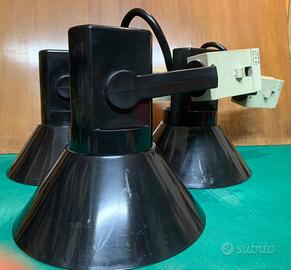 Harveiluce: tris lampade Guzzini design 1970c.