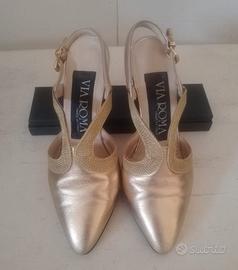 Scarpe con tacco basso dorate