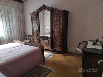 Camera da letto stile barocco