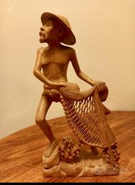 Scultura in legno-il pescatore