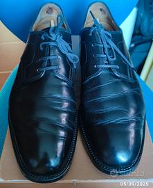 Scarpe eleganti in pelle nera "TOD'S"