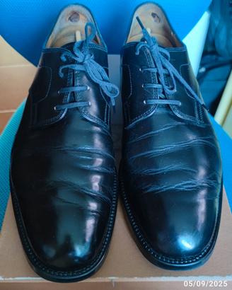 Scarpe eleganti in pelle nera "TOD'S"